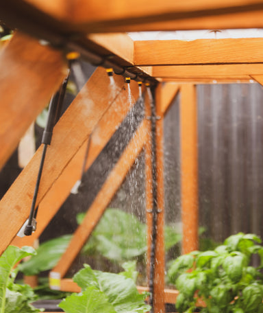 Wooden Raised Garden Bed wth Canopy - irrigation system spraying water